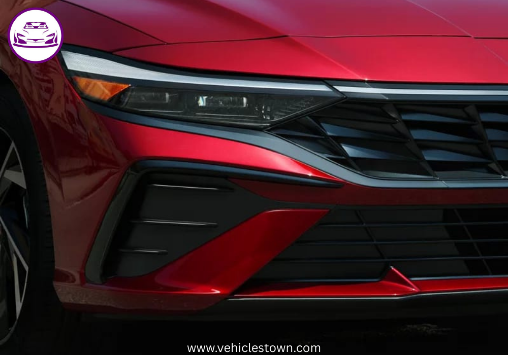 "Front view of the 2025 Hyundai Elantra Hybrid showcasing its sleek parametric grille and LED headlights."