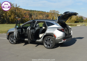"Side view of the Hyundai Tucson Hybrid SUV in motion, showcasing its sleek design and eco-friendly features"