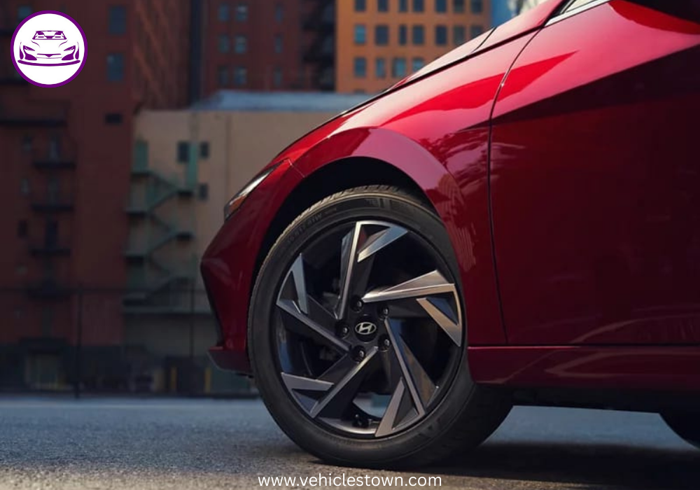 "Front view of the 2025 Hyundai Elantra Hybrid showcasing its sleek parametric grille and LED headlights."