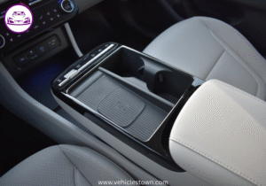 "Side view of the Hyundai Tucson Hybrid SUV in motion, showcasing its sleek design and eco-friendly features"