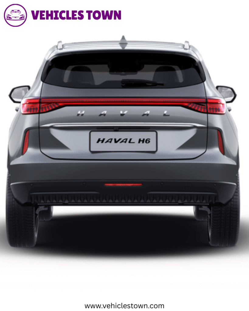 Haval H6 parked on a scenic road, showcasing its bold grille, LED headlights, and sleek SUV profile