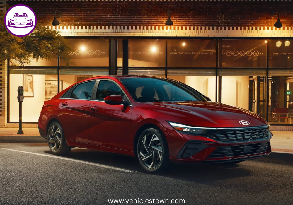 "Front view of the 2025 Hyundai Elantra Hybrid showcasing its sleek parametric grille and LED headlights."​