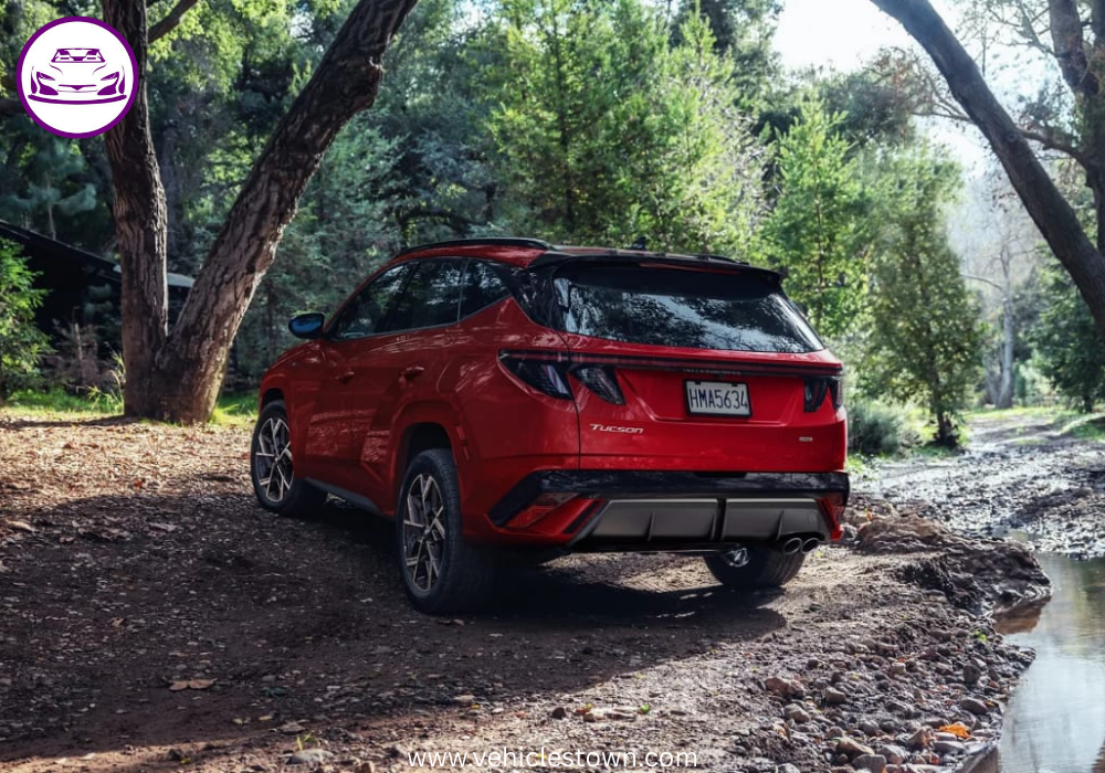 "Side view of the Hyundai Tucson Hybrid SUV in motion, showcasing its sleek design and eco-friendly features"