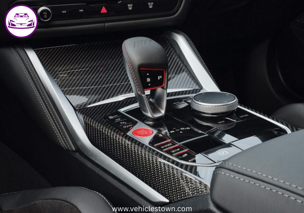 Front and side view of the BMW M3 Sedan showcasing its aggressive grille and sporty design.