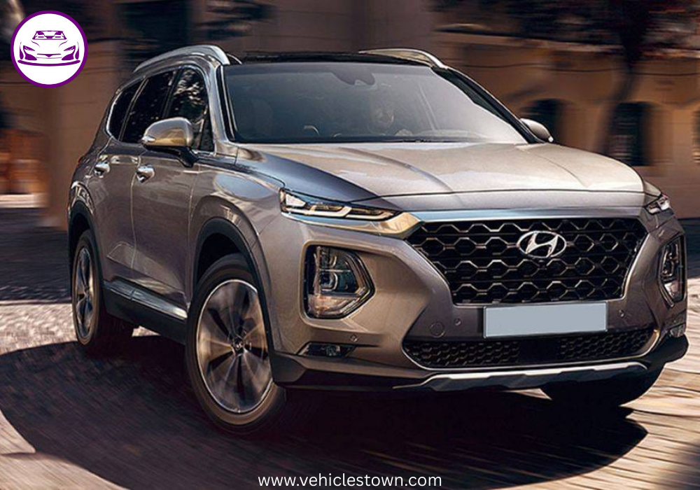 Side view of the Hyundai Santa Fe SUV parked outdoors, showcasing its sleek design.
Modern headlights and bold grille highlight the Santa Fe’s dynamic exterior.