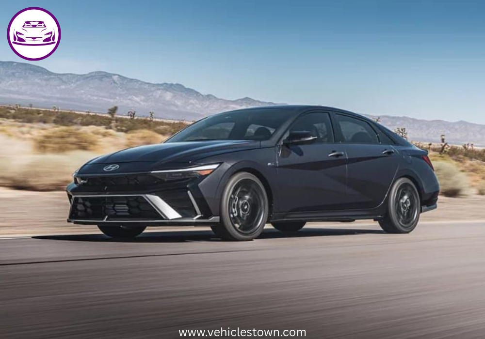 "Front view of the 2025 Hyundai Elantra Hybrid showcasing its sleek parametric grille and LED headlights."