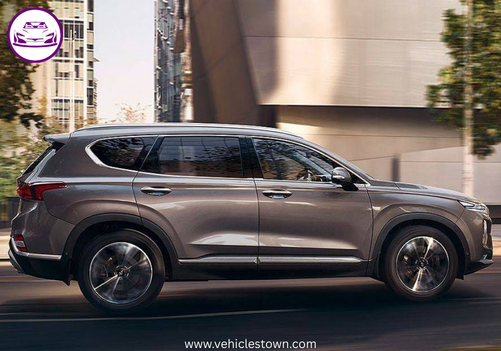 Side view of the Hyundai Santa Fe SUV parked outdoors, showcasing its sleek design.
Modern headlights and bold grille highlight the Santa Fe’s dynamic exterior.