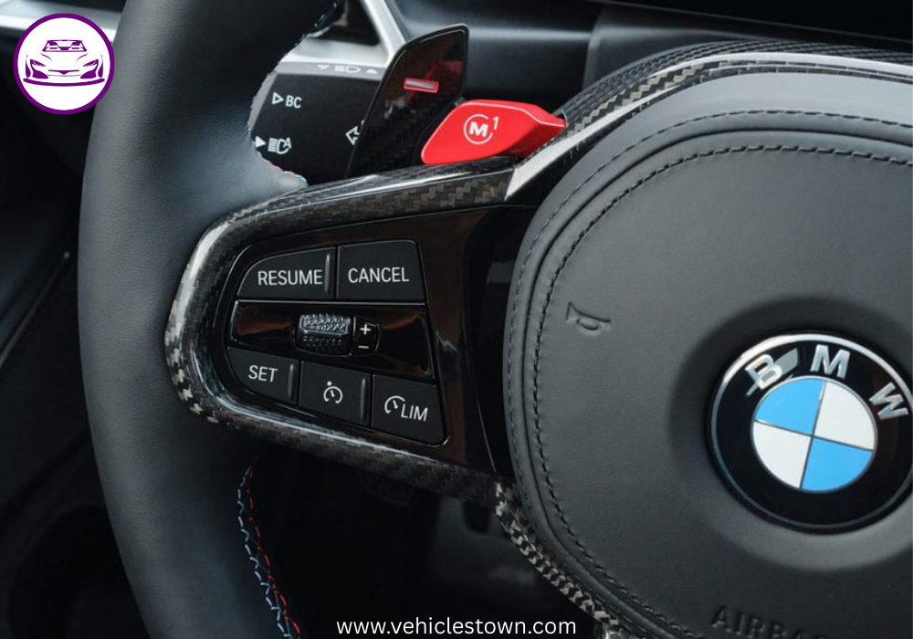 Front and side view of the BMW M3 Sedan showcasing its aggressive grille and sporty design.