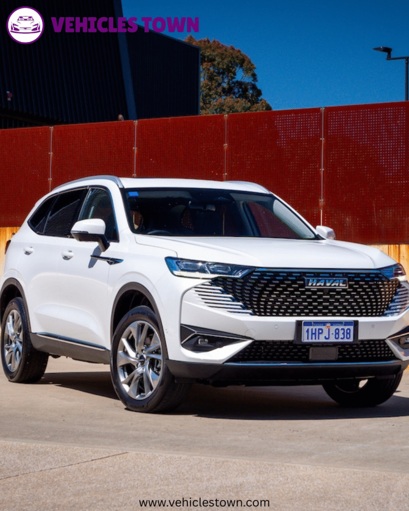 Haval H6 parked on a scenic road, showcasing its bold grille, LED headlights, and sleek SUV profile