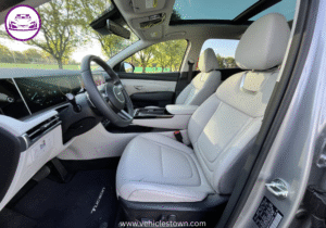 "Side view of the Hyundai Tucson Hybrid SUV in motion, showcasing its sleek design and eco-friendly features"