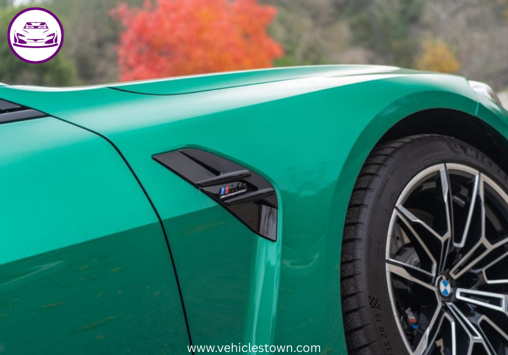 "BMW M4 Convertible xDrive in motion with sleek design and open-top driving, showcasing powerful performance and luxury."