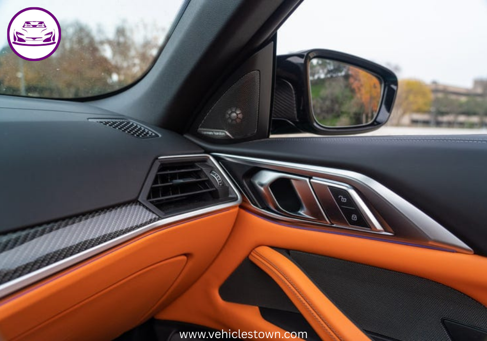 "BMW M4 Convertible xDrive in motion with sleek design and open-top driving, showcasing powerful performance and luxury."