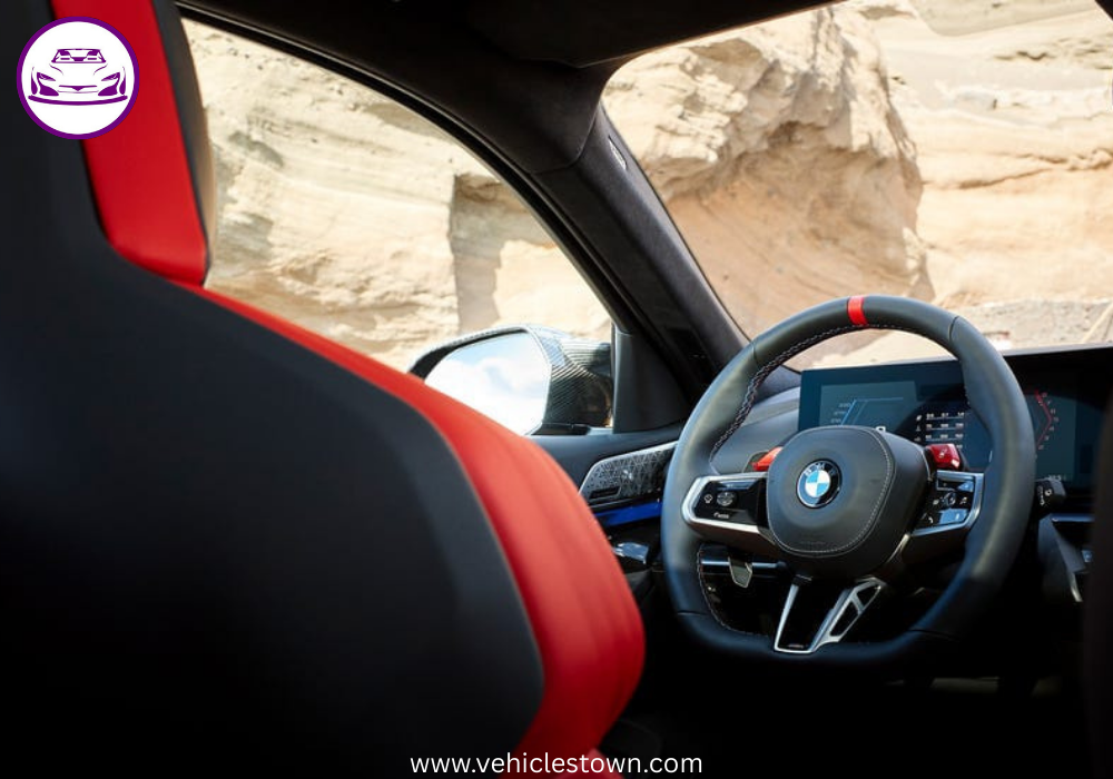 2025 BMW M5 Touring in motion, showcasing its sleek design, hybrid performance, and M xDrive system.
