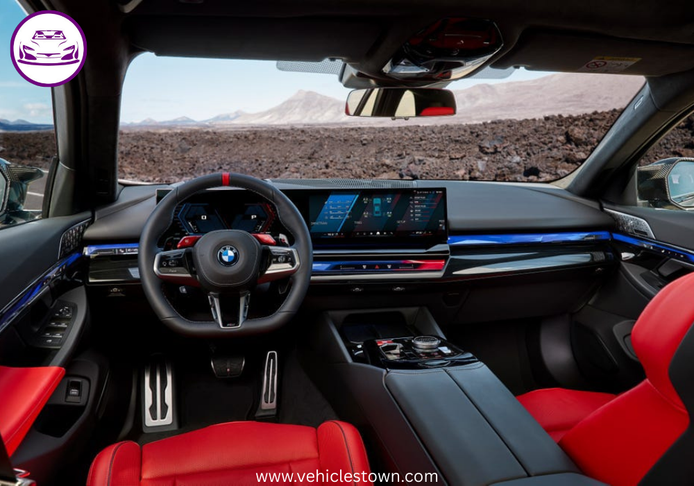 2025 BMW M5 Touring in motion, showcasing its sleek design, hybrid performance, and M xDrive system.