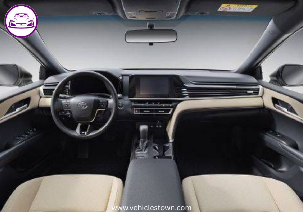 **Alt Text:**
Toyota Camry LE 2025 – elegant silver sedan with sleek LED headlights and stylish body lines, parked in a modern urban setting.