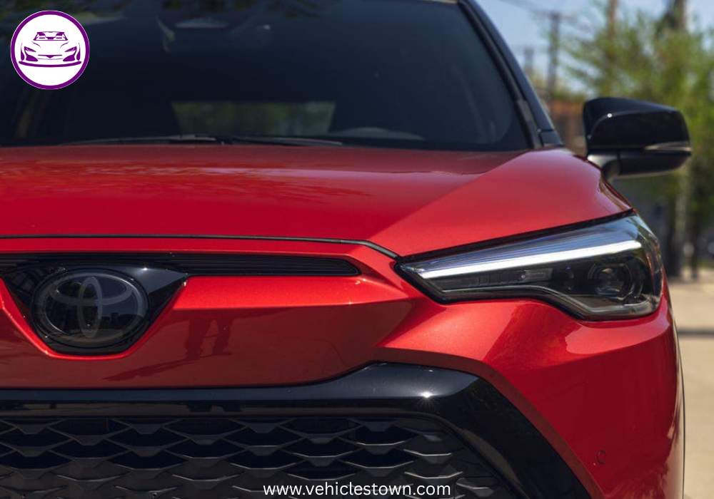 Front view of the Toyota Corolla Cross Hybrid 2025 showcasing its bold grille and sleek LED headlights.