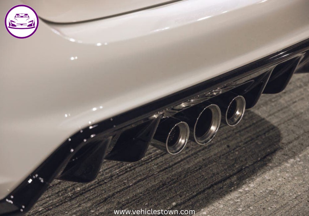 Front view of the bold and sporty red Honda Civic Type R showcasing its aggressive grille and large rear wing.