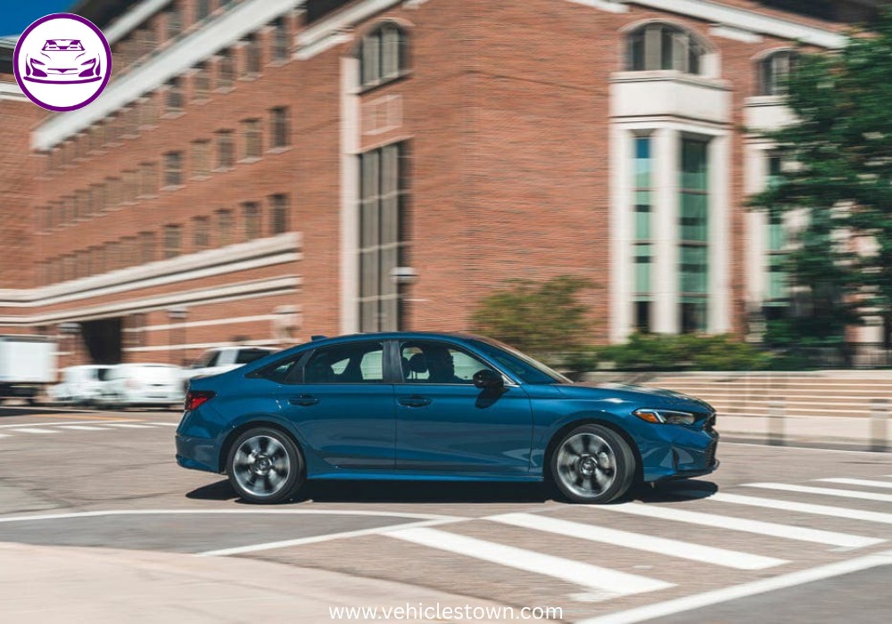 2025 Honda Civic Standard in silver, showcasing sleek design and modern LED headlights.