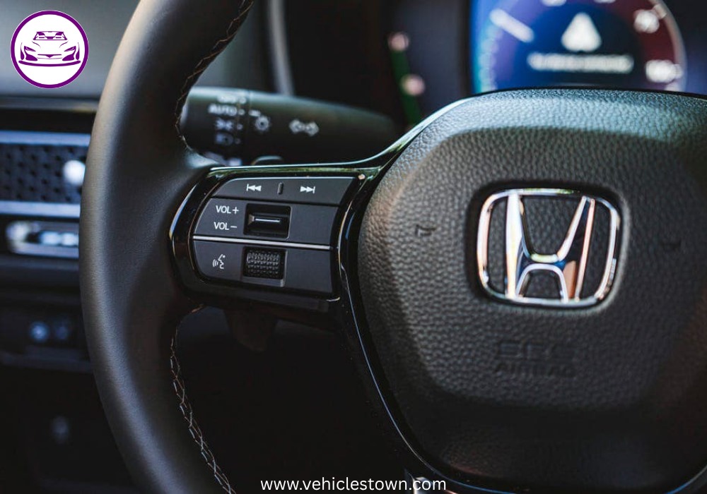 2025 Honda Civic Standard in silver, showcasing sleek design and modern LED headlights.