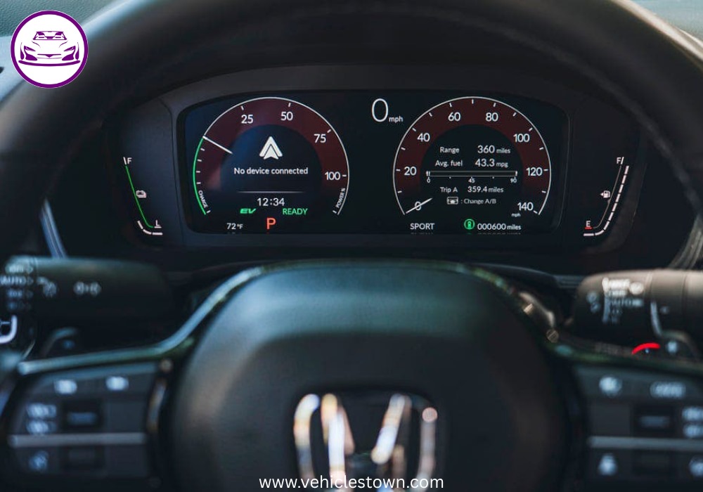 2025 Honda Civic Standard in silver, showcasing sleek design and modern LED headlights.