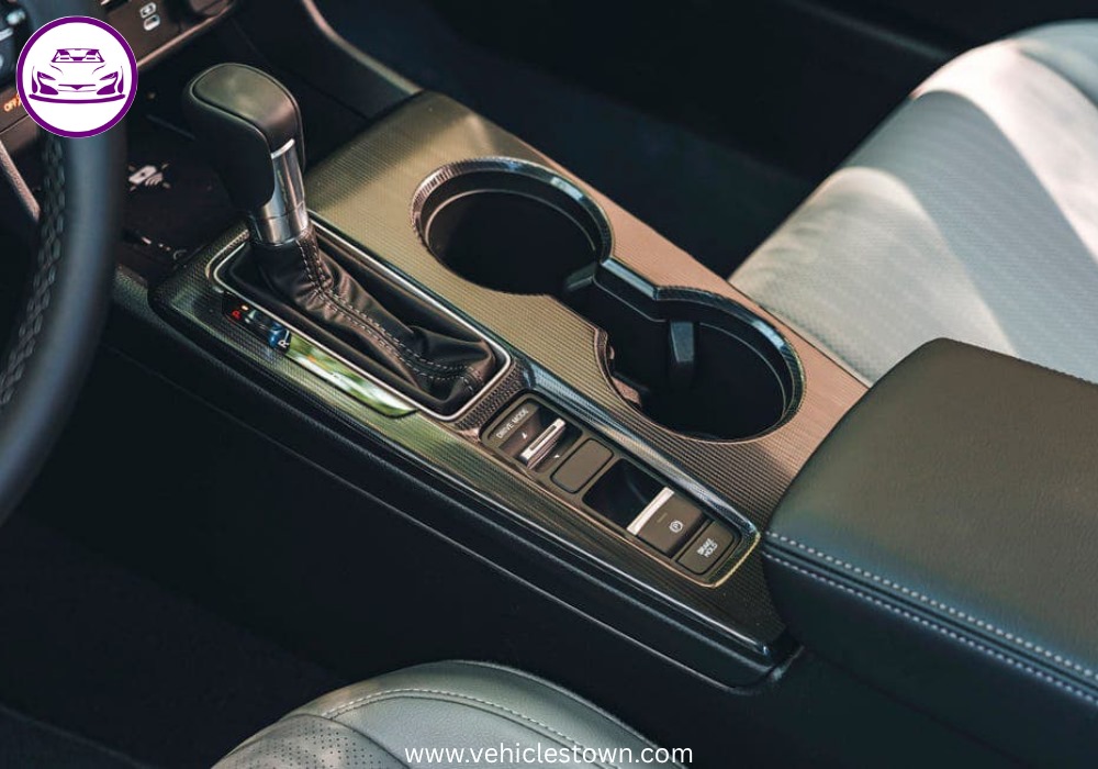 2025 Honda Civic Standard in silver, showcasing sleek design and modern LED headlights.