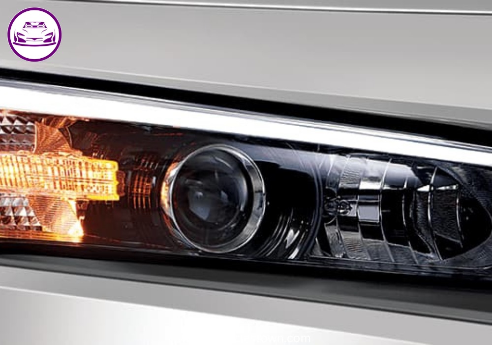2025 Honda Civic Standard in silver, showcasing sleek design and modern LED headlights.