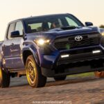 Side view of the Toyota Tacoma TRD Sport showcasing its sporty design and 18-inch alloy wheels.