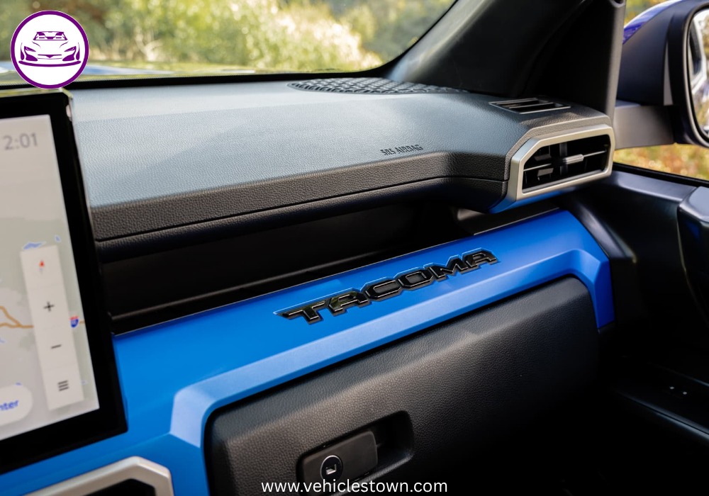 Side view of the Toyota Tacoma TRD Sport showcasing its sporty design and 18-inch alloy wheels.