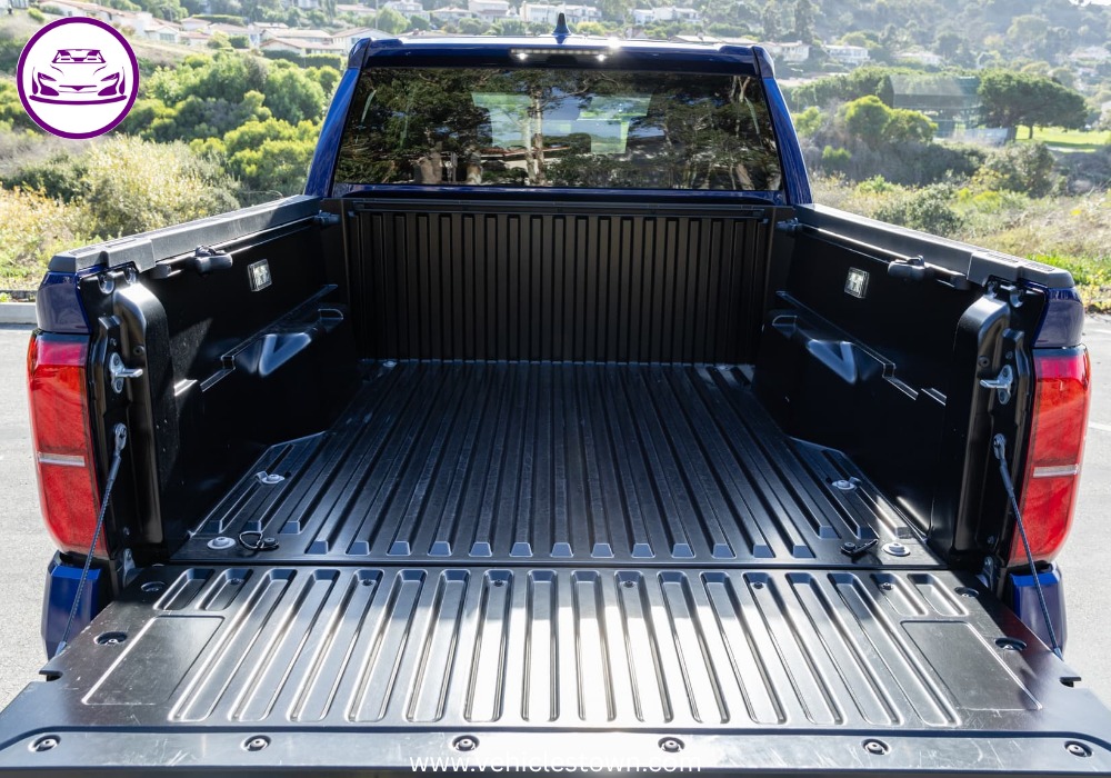 Side view of the Toyota Tacoma TRD Sport showcasing its sporty design and 18-inch alloy wheels.v