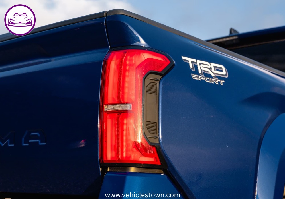 Side view of the Toyota Tacoma TRD Sport showcasing its sporty design and 18-inch alloy wheels.