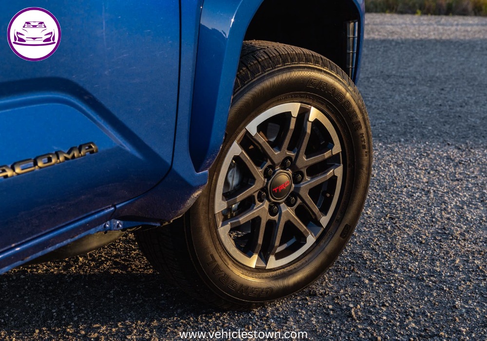 Side view of the Toyota Tacoma TRD Sport showcasing its sporty design and 18-inch alloy wheels.