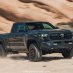 Side view of the 2025 Toyota Tacoma PreRunner showcasing its rugged design and high ground clearance.