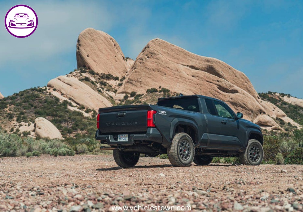 Side view of the 2025 Toyota Tacoma PreRunner showcasing its rugged design and high ground clearance.