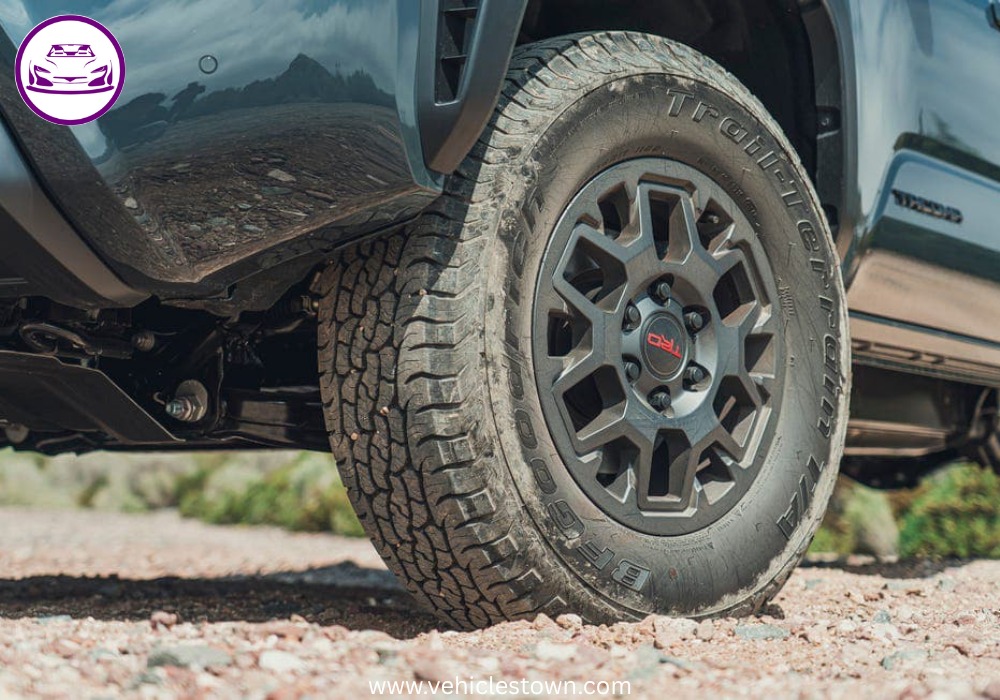 Side view of the 2025 Toyota Tacoma PreRunner showcasing its rugged design and high ground clearance.
