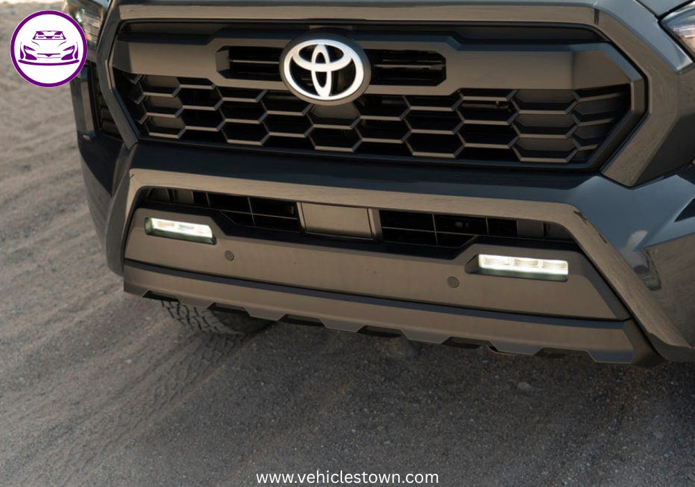Side view of the 2025 Toyota Tacoma PreRunner showcasing its rugged design and high ground clearance.