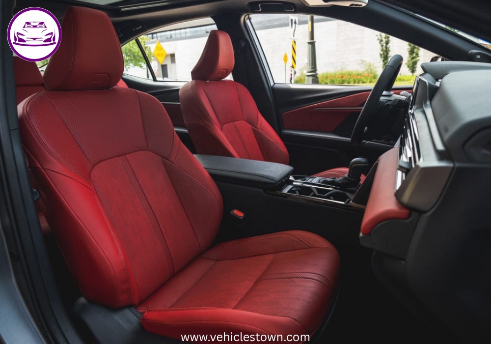 Toyota Camry XSE in a sporty stance featuring blacked-out grille, 19-inch alloy wheels, and aggressive LED headlights on a city street.