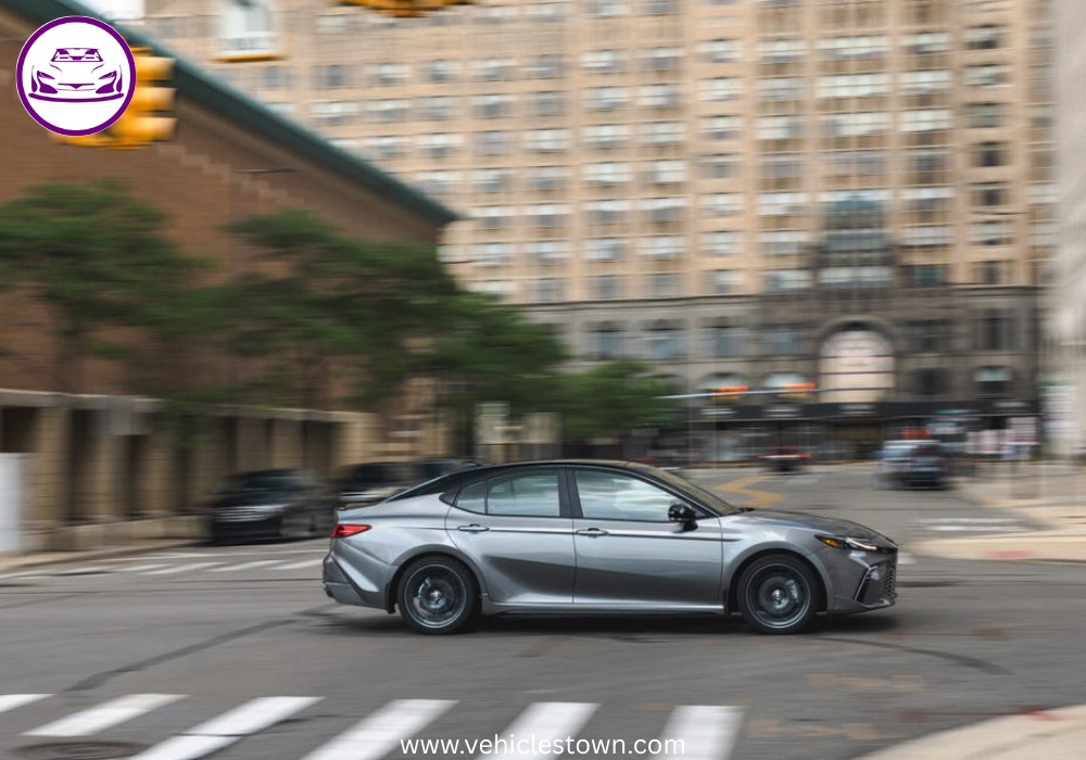 Toyota Camry XSE in a sporty stance featuring blacked-out grille, 19-inch alloy wheels, and aggressive LED headlights on a city street.