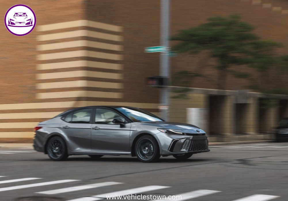 Toyota Camry XSE in a sporty stance featuring blacked-out grille, 19-inch alloy wheels, and aggressive LED headlights on a city street.