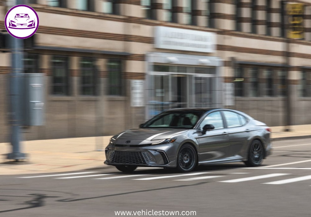 Toyota Camry XSE in a sporty stance featuring blacked-out grille, 19-inch alloy wheels, and aggressive LED headlights on a city street.