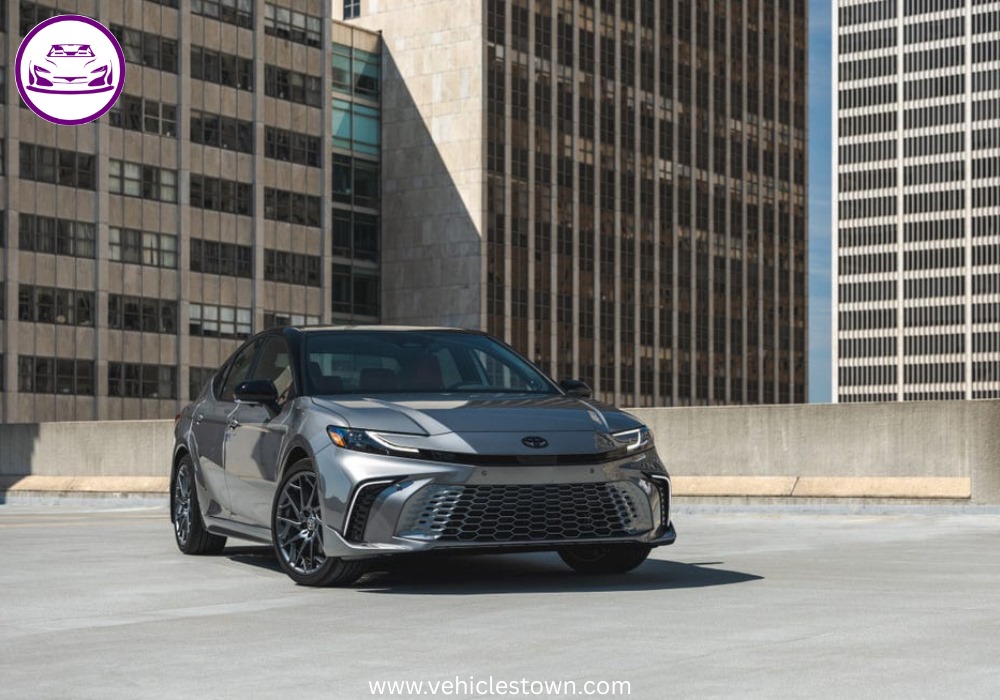 Toyota Camry XSE in a sporty stance featuring blacked-out grille, 19-inch alloy wheels, and aggressive LED headlights on a city street.
