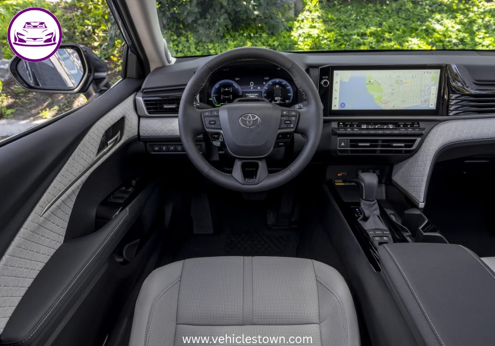 **Alt Text:**
Toyota Camry XLE front and side view showcasing its sleek design, LED headlights, and alloy wheels in a premium urban setting.