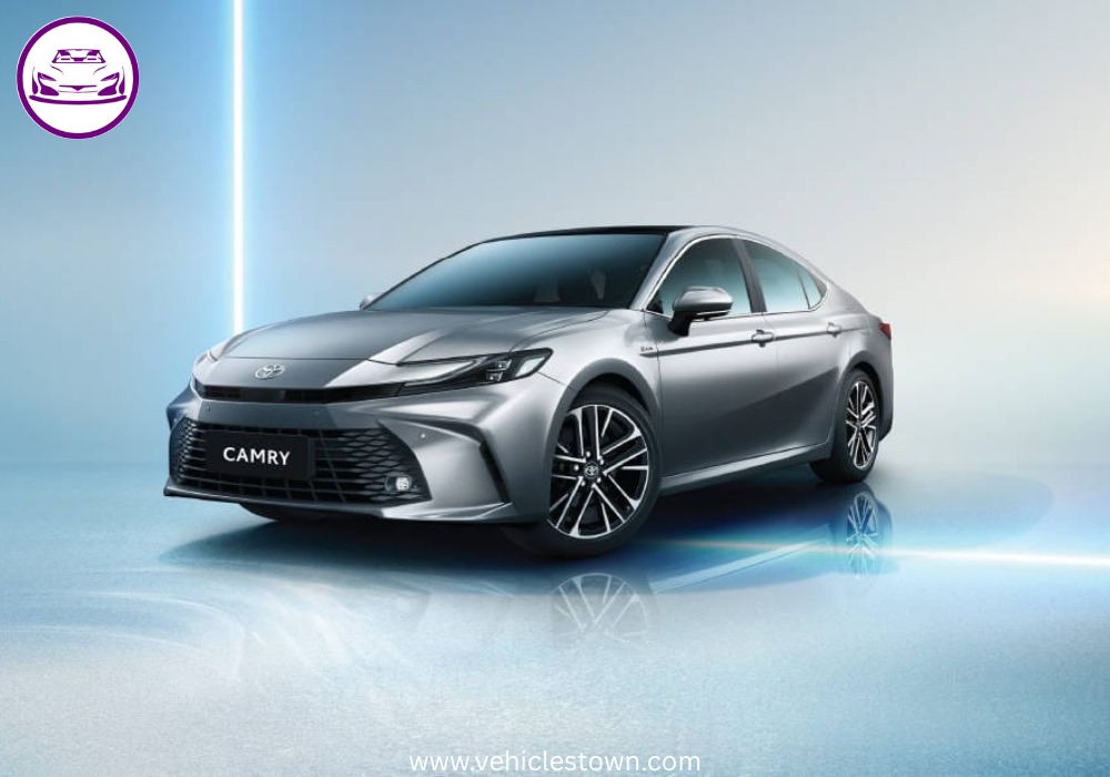 **Alt Text:** Toyota Camry XLE front and side view showcasing its sleek design, LED headlights, and alloy wheels in a premium urban setting.