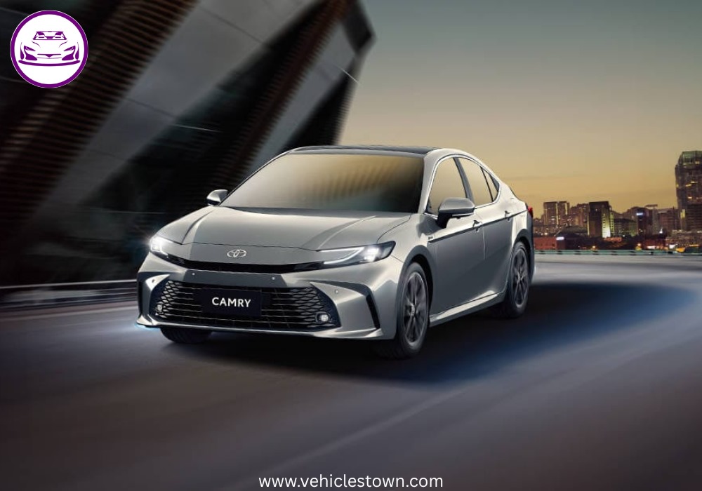 **Alt Text:**
Toyota Camry XLE front and side view showcasing its sleek design, LED headlights, and alloy wheels in a premium urban setting.