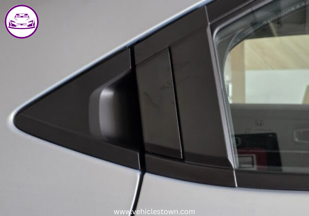 Front and side view of the 2025 Honda HR-V e:HEV hybrid SUV in Pakistan showcasing its LED headlights, bold grille, and sleek body design.