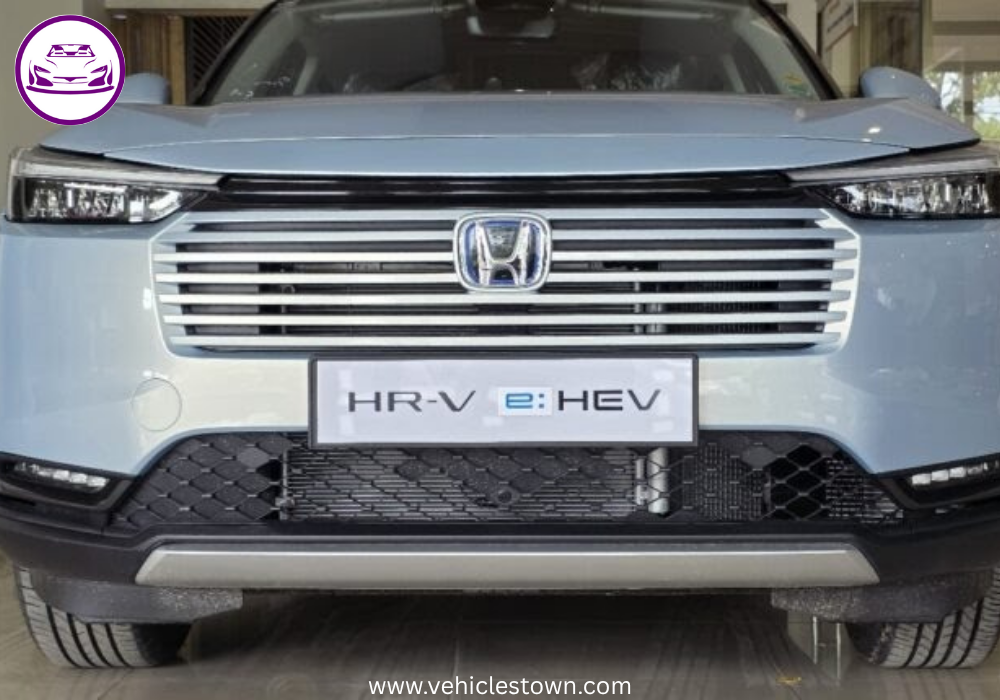 Front and side view of the 2025 Honda HR-V e:HEV hybrid SUV in Pakistan showcasing its LED headlights, bold grille, and sleek body design.