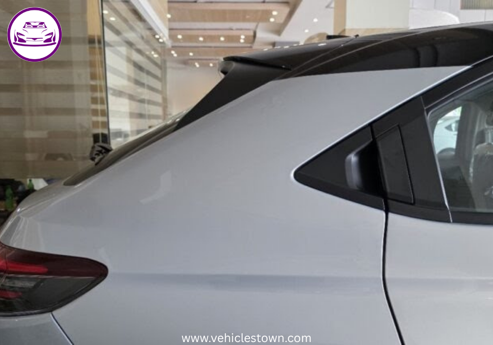 Front and side view of the 2025 Honda HR-V e:HEV hybrid SUV in Pakistan showcasing its LED headlights, bold grille, and sleek body design.