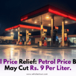 A happy man refueling his car at a petrol pump, smiling due to reduced petrol prices